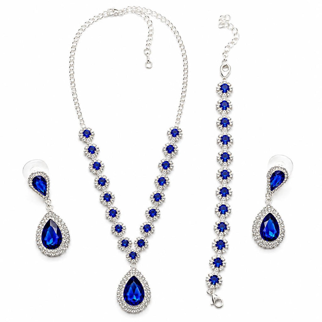 Four-piece fashion jewelry set with sapphires and diamonds from Republic Mercantile, featuring elegant necklaces and earrings.