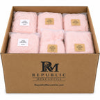 Set of 21 pink and white infant jumpsuits from Republic Mercantile in a wholesale reseller's box, arranged neatly in the image.