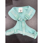 Vibrant Life green dog harness in size medium with adjustable straps and padded chest area for comfortable walking.