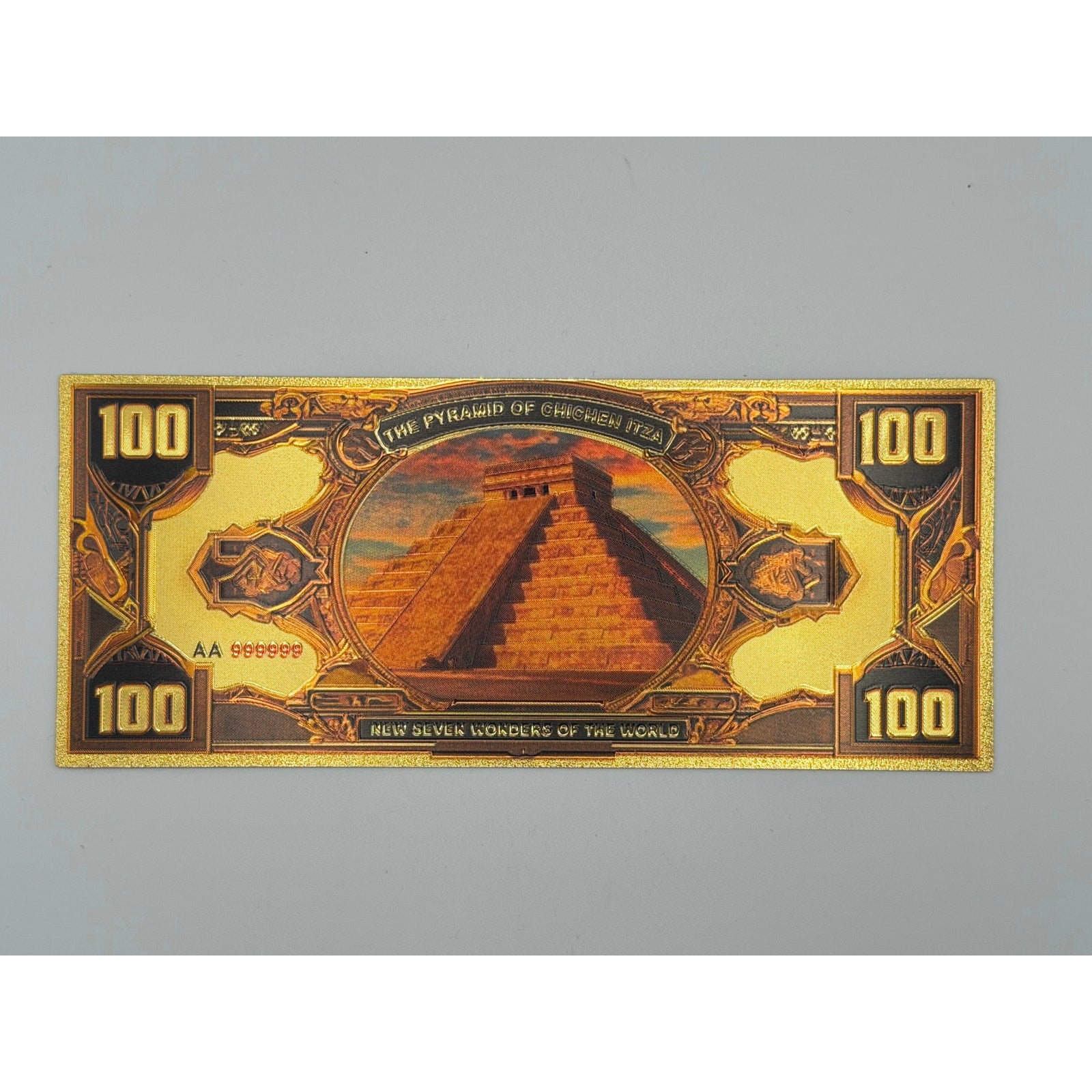 Set of seven gold foiled novelty notes featuring the 7 Wonders of the World by Republic Mercantile, displayed on a white background.