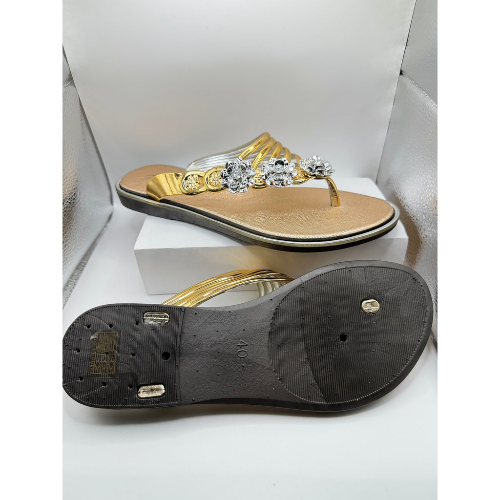Bejeweled women's gold sandals with bling details, size US 9-9.5, featuring decorative straps and a stylish open-toe design.