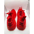 Women's red athletic sneakers by Republic Mercantile, size 10.5, with breathable mesh and white sole, suitable for running or casual wear.