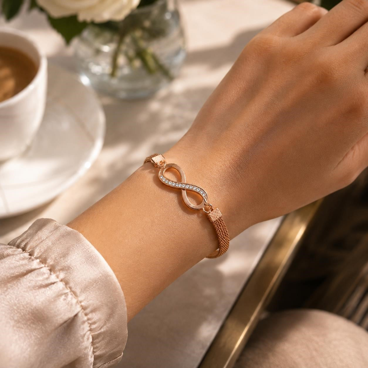 Rose gold Figure 8 fashion jewelry bracelet by Republic Mercantile featuring sleek, modern design with smooth curves and shiny finish.
