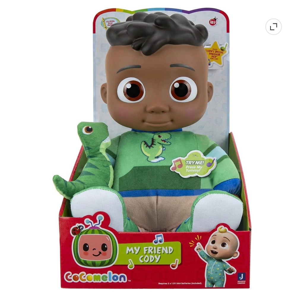 Cocomelon My Friend Cody plush toy with dinosaur, featuring a smiling Cody and a small dinosaur, pressing tummy to play music.