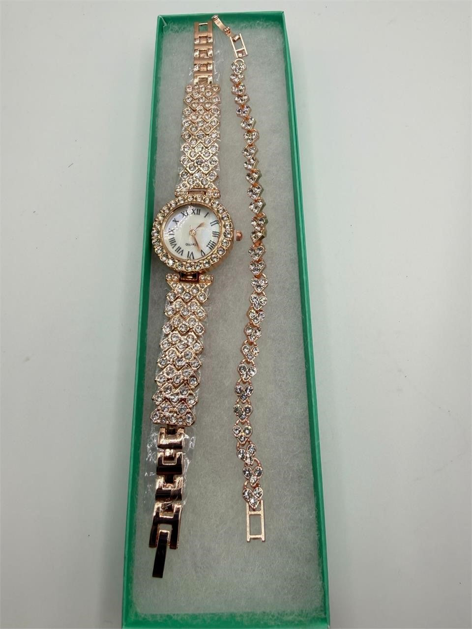 Ladies rose gold watch and bracelet set with cubic zirconia accents, stylish jewelry from Republic Mercantile.