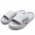 Gray foam slides by VEPCQ for women’s size 7.5-8.5 and men’s 5.5-6.5, featuring a simple slip-on design.
