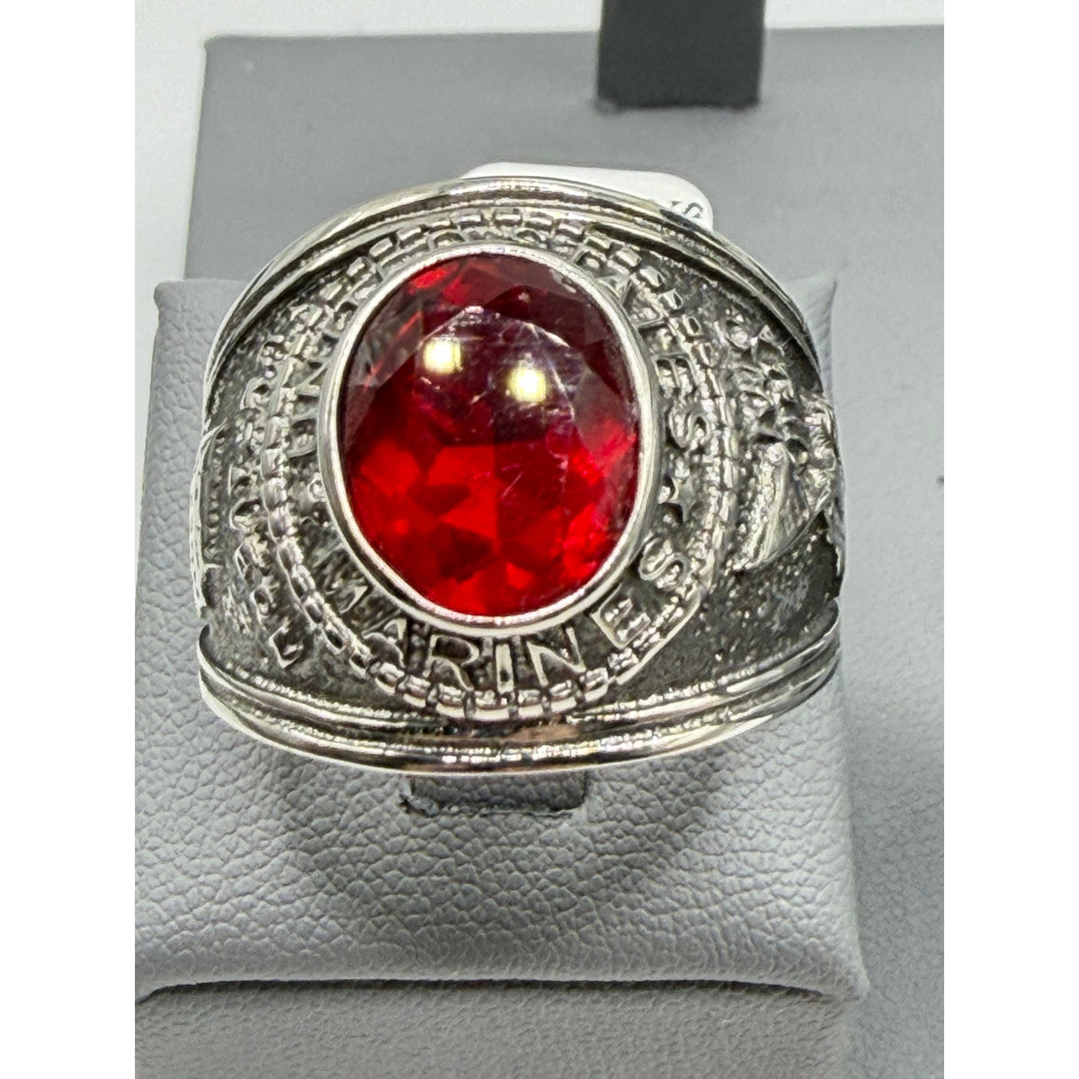 Men's US Marine Corps signet ring in silver with red accents, size 12, from Republic Mercantile featuring engraved Marine emblem.