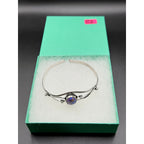 Silver plated bangle gemstone bracelet with handcrafted design from Republic Mercantile, featuring colorful gemstone accents.