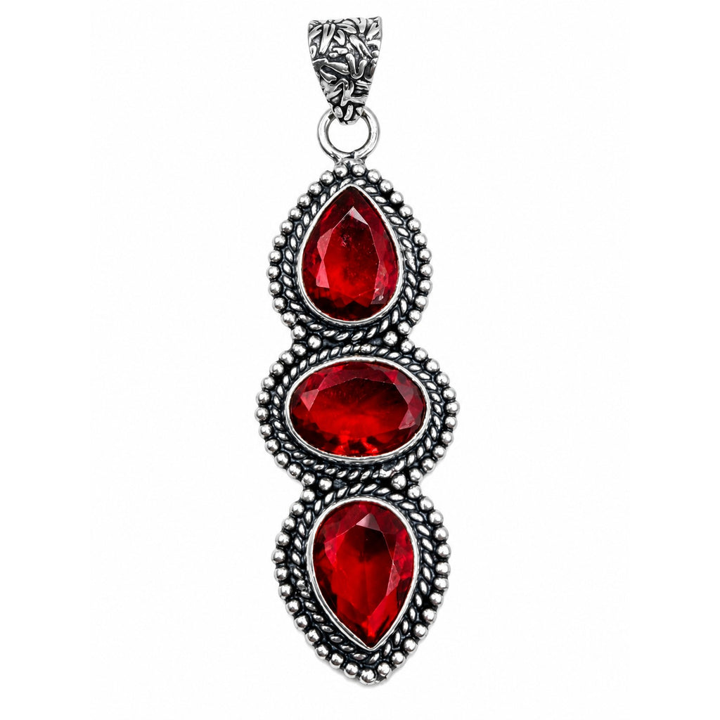 Red garnet oval and pear-shaped gemstones jewelry pendant in sterling silver plating, featuring Republic Mercantile branding.