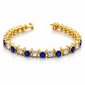Blue and white gem bracelet set in gold tone from Republic Mercantile, featuring multiple elegant gemstone accessories.