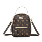 Brown Aohao heart-shaped crossbody faux leather backpack with zipper closure and adjustable strap, designed for stylish everyday use.