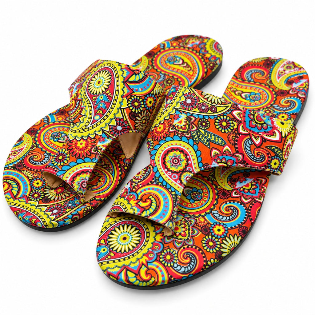 Women's boho multi-color slip-on sandals by Republic Mercantile, size 11, with vibrant patterned straps and comfortable flat soles.