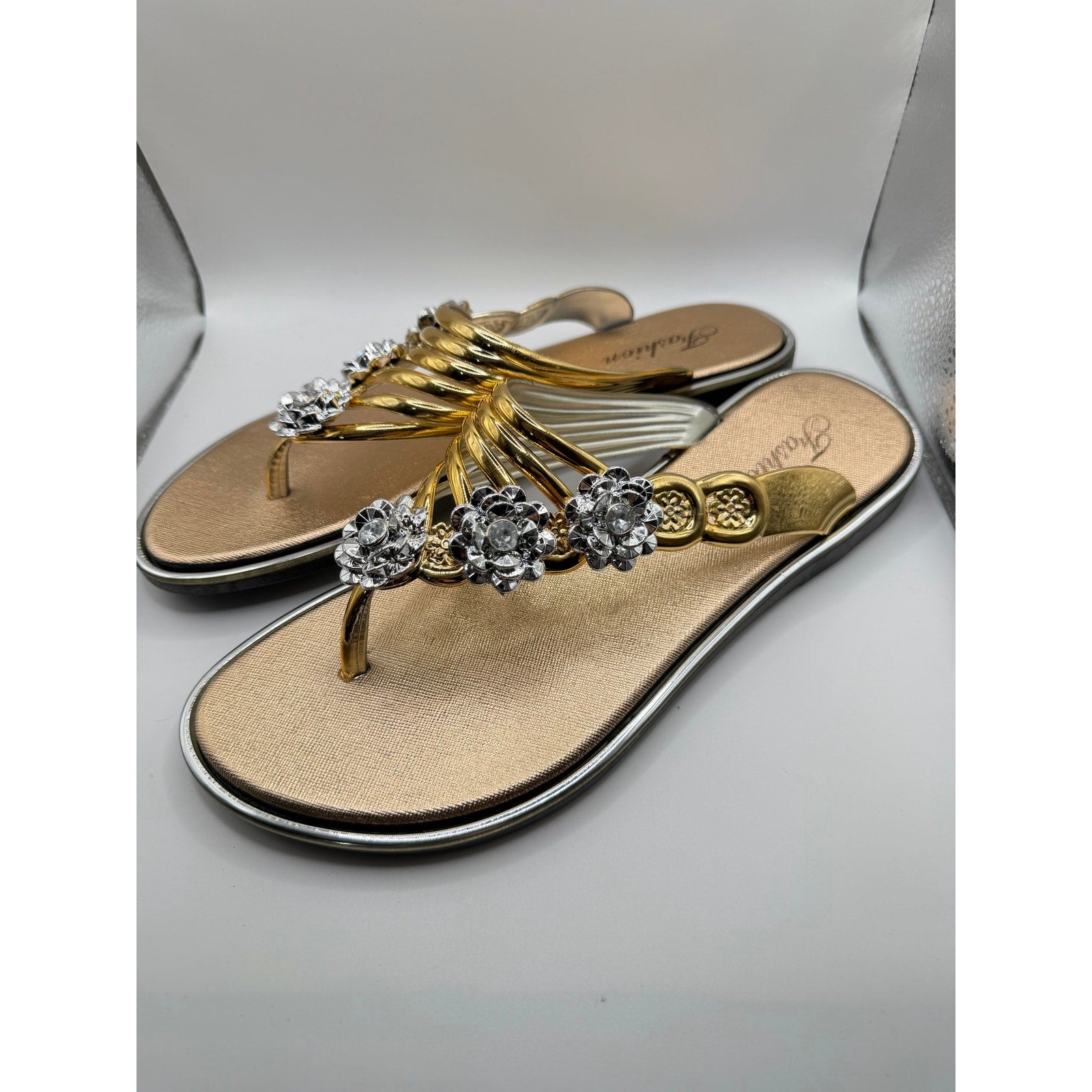 Bejeweled gold women's sandals by Republic Mercantile with bling accents, size US 9-9.5, featuring decorative straps and sparkling details.
