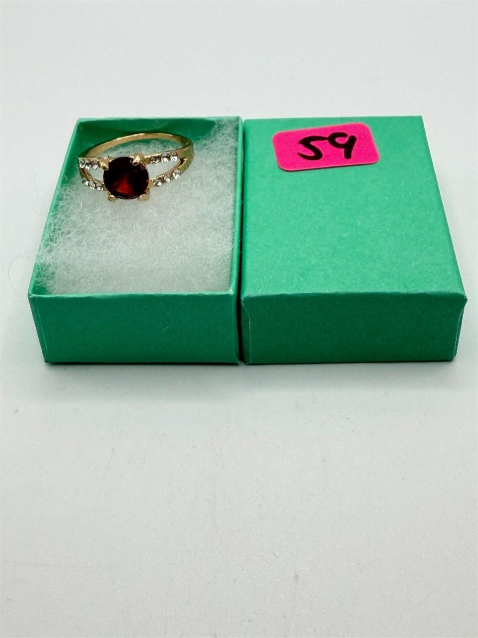 Gold tone fashion jewelry gem ring by Republic Mercantile, size 8.5, featuring sparkling gemstone accents on a stylish band.