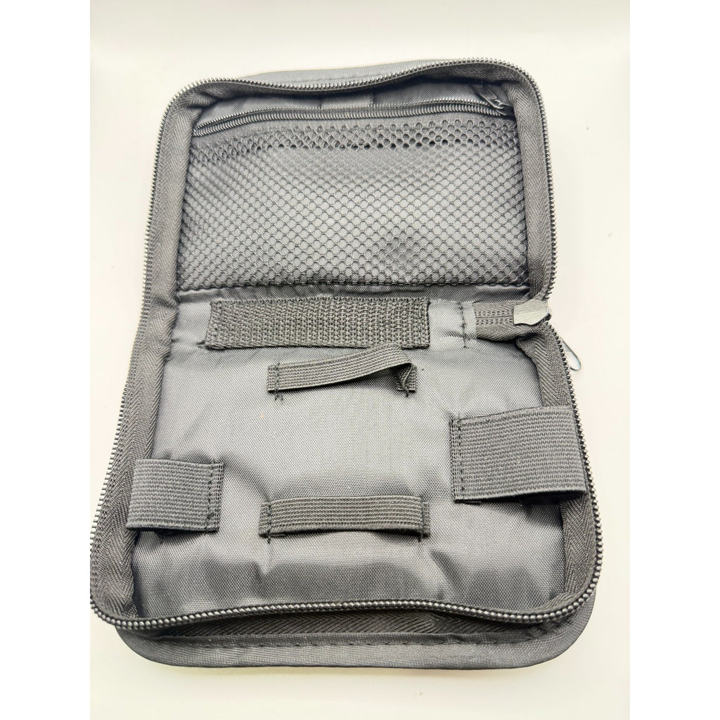 Empty HouseVibe compact travel organizer case for medical supplies, with multiple compartments for organization.