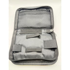 Empty HouseVibe compact travel organizer case for medical supplies, with multiple compartments for organization.