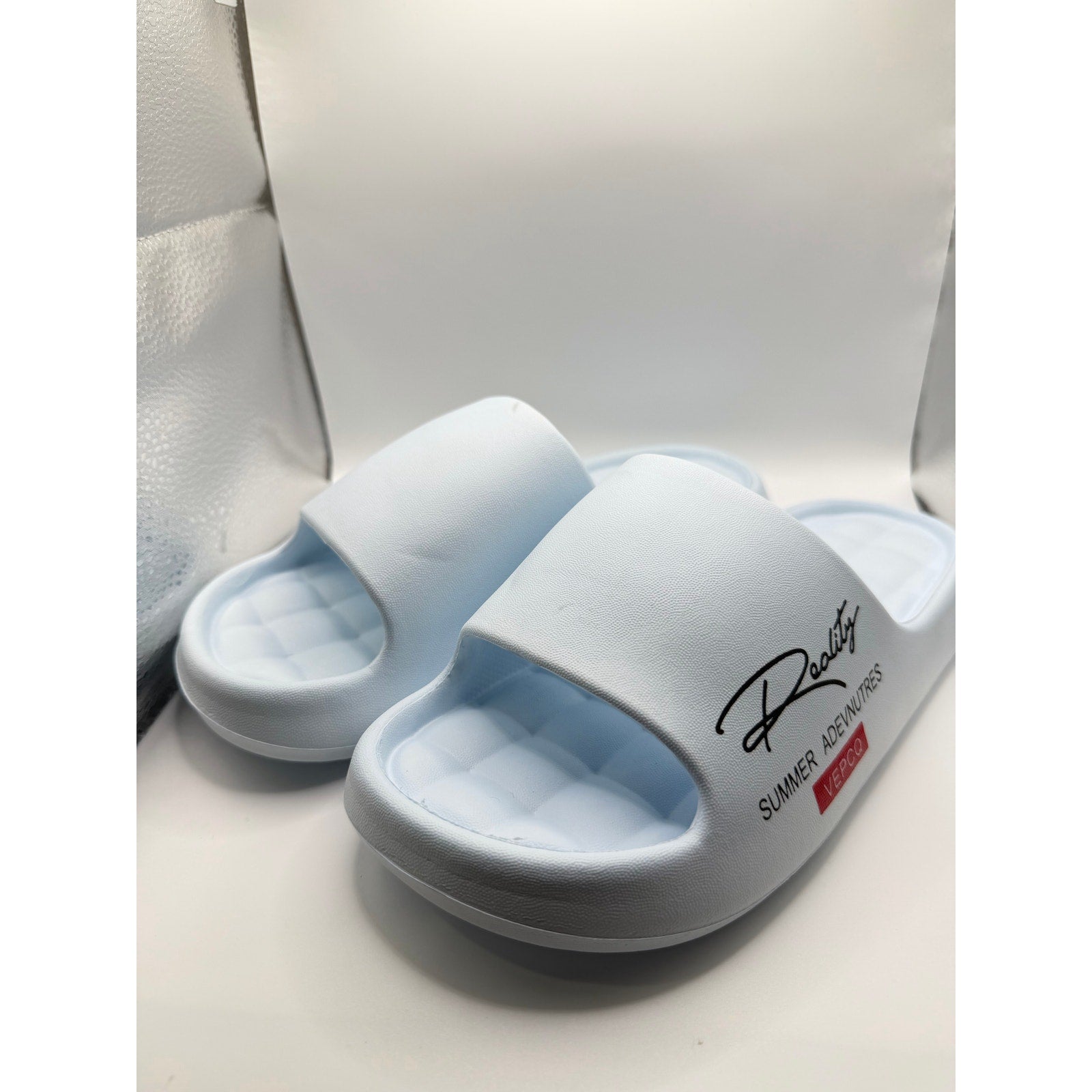 Vepco Reality women's light blue cushioned slides size 8 Euro 38-39, showing the comfortable slip-on design and soft footbed.