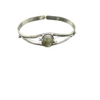 Silver plated bangle gem bracelet, handcrafted by Republic Mercantile, featuring colorful gemstones and intricate design details.