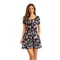 Fantaslook black floral dress in size M, featuring a flowy silhouette and vibrant floral pattern, perfect for casual or semi-formal wear.