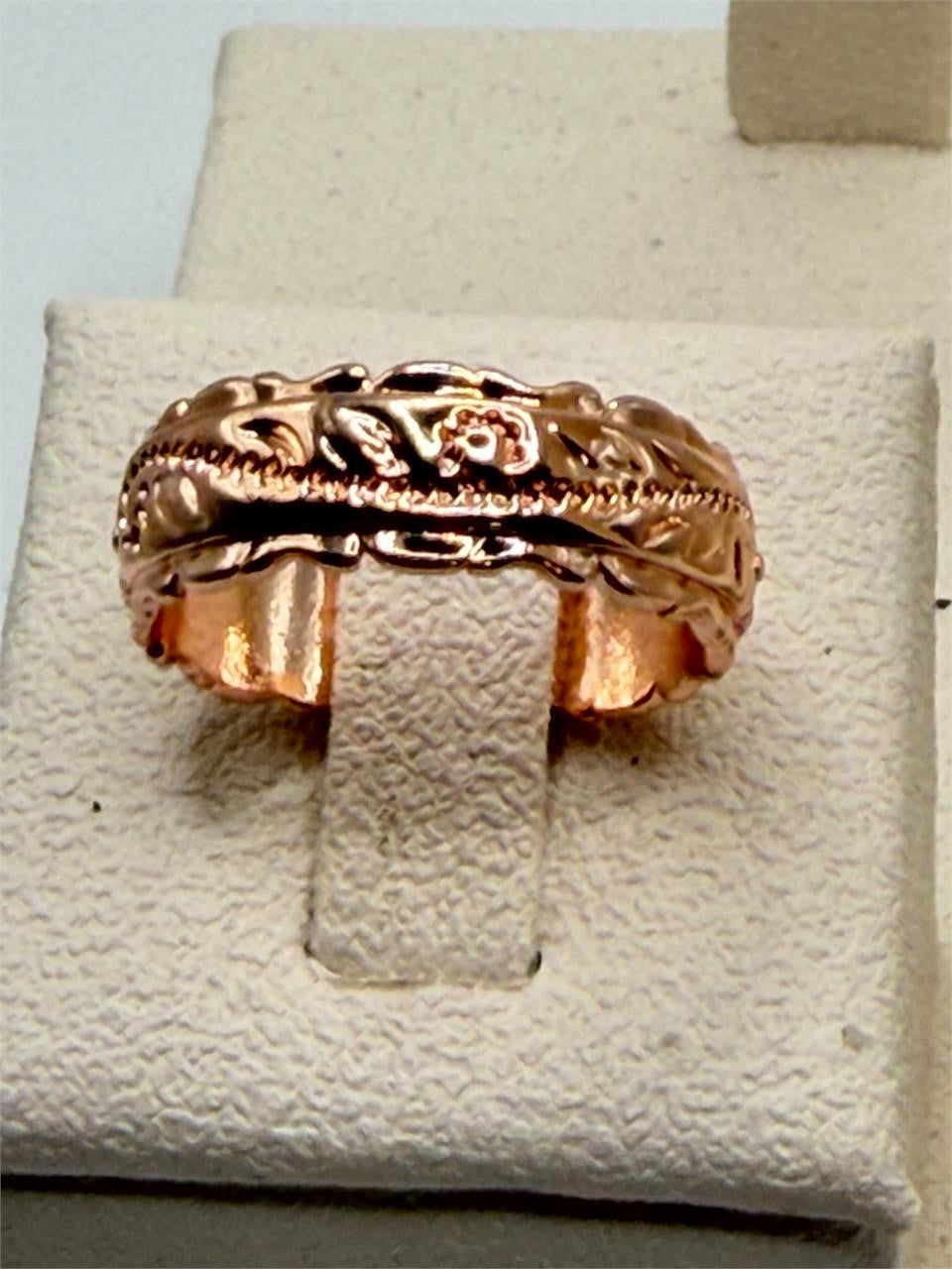 Carved rose gold ladies ring in size 6.5 with intricate design, by Republic Mercantile, displayed on a plain background.