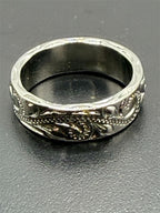 Carved silver men's ring in size 9 by Republic Mercantile with intricate engraved details and a polished finish.