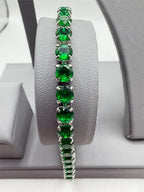 Silver tone women's bracelet with green gemstone accents, featuring a stylish design from Republic Mercantile.