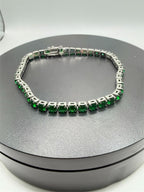 Silver tone women's bracelet featuring green gem accents, crafted by Republic Mercantile with elegant, eye-catching design.