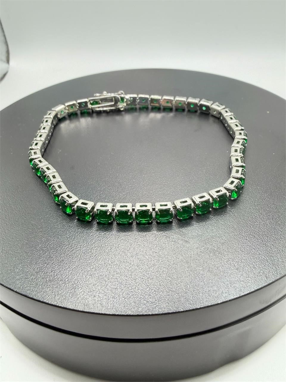 Silver tone women's bracelet featuring green gem accents, crafted by Republic Mercantile with elegant, eye-catching design.