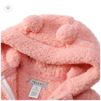 Set of 21 pink and white infant jumpsuits from Republic Mercantile's wholesale reseller box, displaying soft fabric and baby clothing.