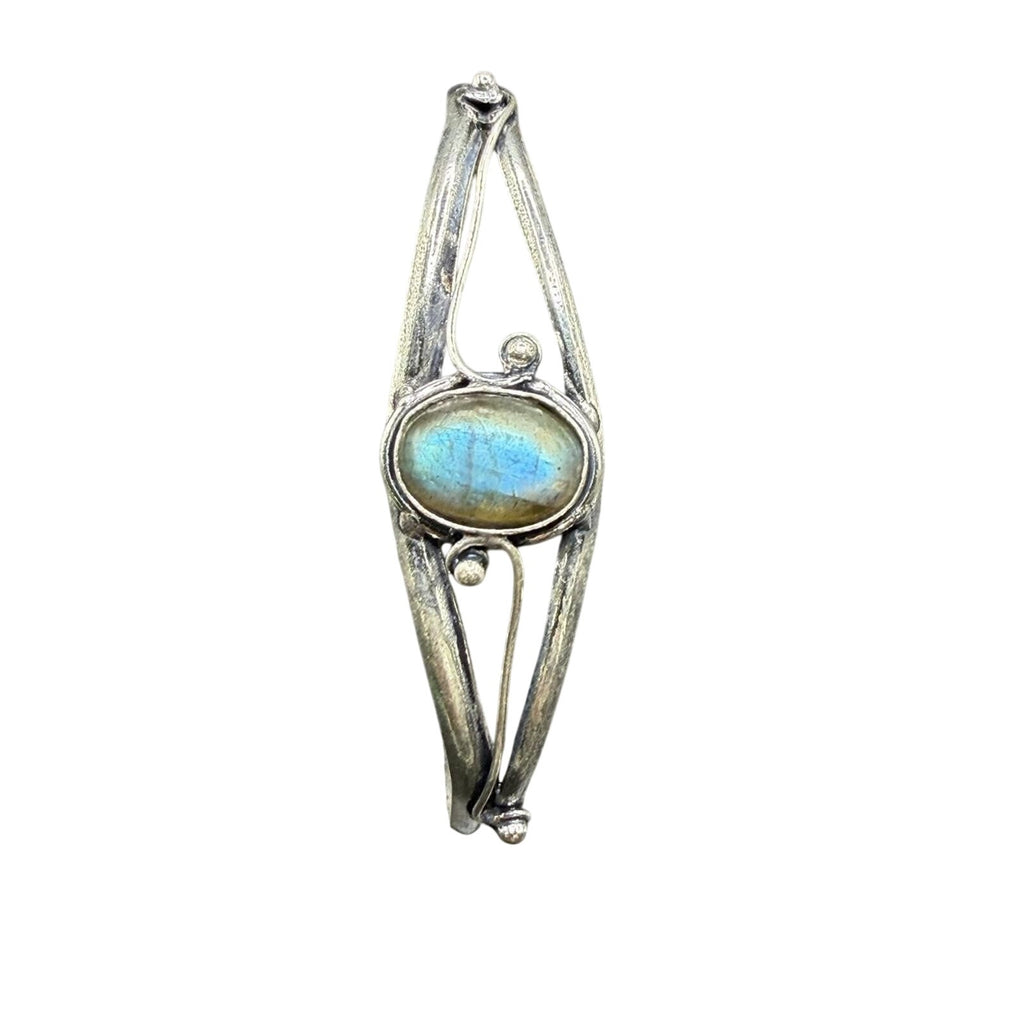 Silver plated bangle gem bracelet with handcrafted design, featuring sparkling gemstones and intricate detailing.