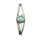 Silver plated bangle gem bracelet with handcrafted design, featuring sparkling gemstones and intricate detailing.