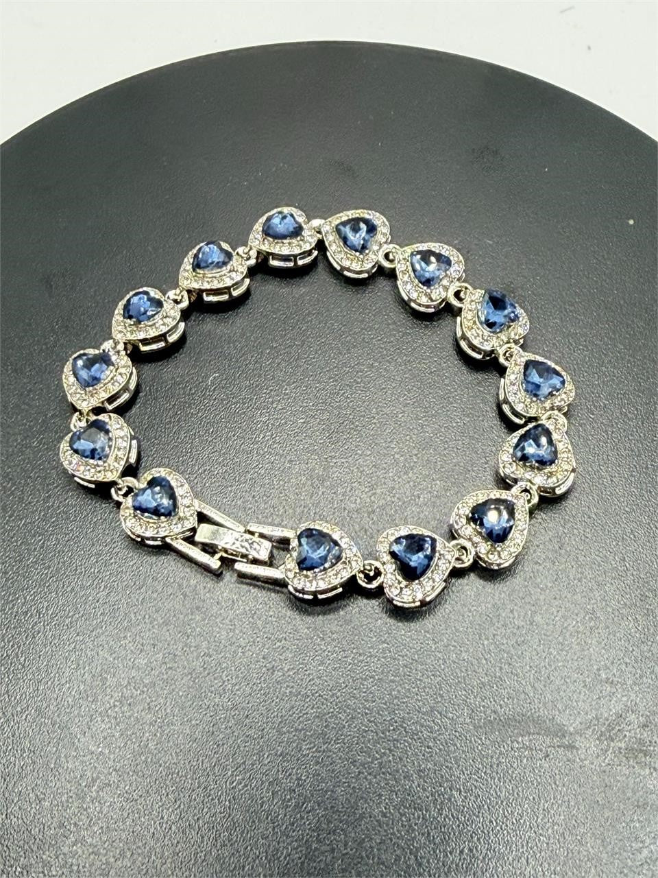 Gorgeous blue tanzanite gemstone women's bracelet with silver chain, featuring sparkling tanzanite stones and elegant design