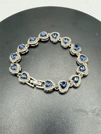 Gorgeous blue tanzanite gemstone women's bracelet with silver chain, featuring sparkling tanzanite stones and elegant design