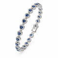 Blue Tanzanite Gem Women's Bracelet featuring vibrant tanzanite stones and silver links, stylish and elegant jewelry piece.