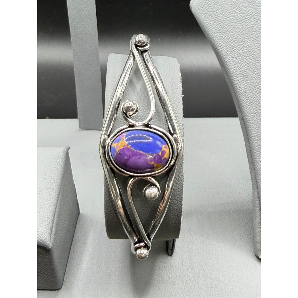 Silver plated bangle gem bracelet from Republic Mercantile, showcasing intricate handcrafted design with sparkling gemstones.