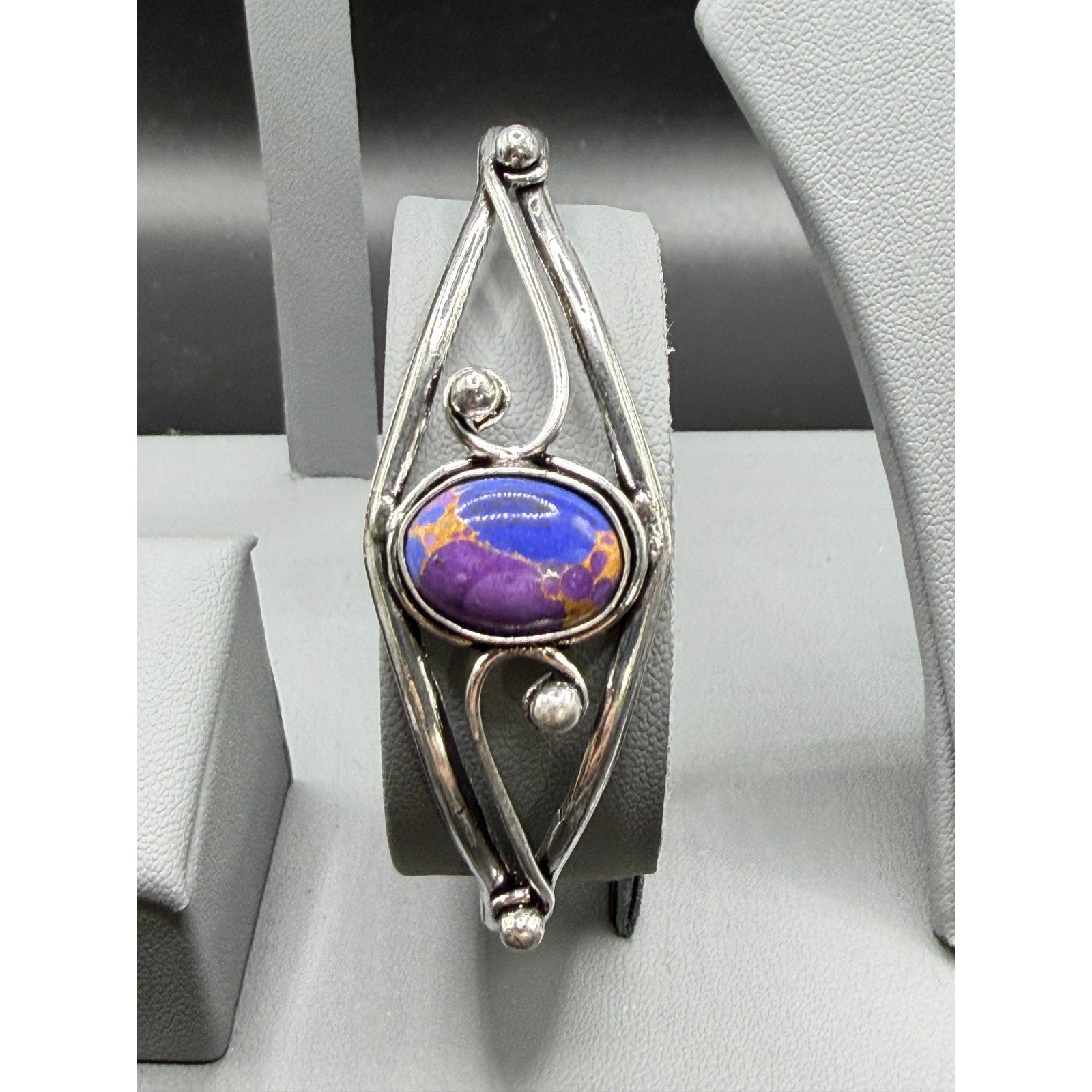 Silver plated bangle gem bracelet from Republic Mercantile, showcasing intricate handcrafted design with sparkling gemstones.