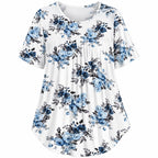 Fantaslook women's short sleeve floral tunic top in blue and white, size XL, featuring a relaxed fit and vibrant flower pattern.