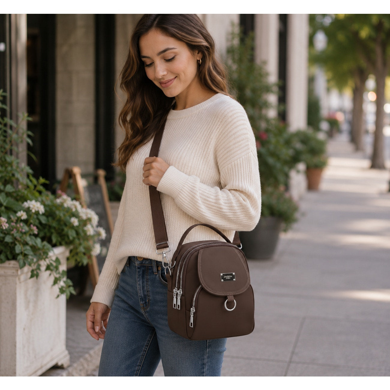 Women's Jingpin single shoulder bag with multiple pockets and zippers, featuring a stylish design in a versatile color.