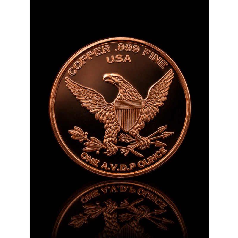 Close-up of Republic Mercantile 1 AVDP oz .999 fine copper collectible coin featuring the 1804 bust design, detailed surface.