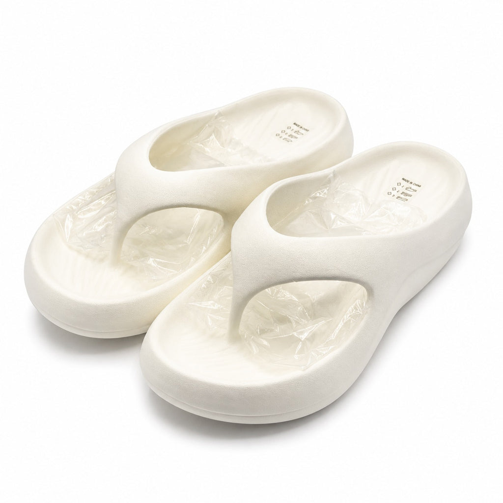 White Puziarl slide comfort shoes in size 6-6.5 with a simple slip-on design and cushioned footbed for casual wear.