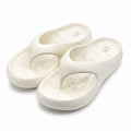 White Puziarl slide comfort shoes in size 6-6.5 with a simple slip-on design and cushioned footbed for casual wear.