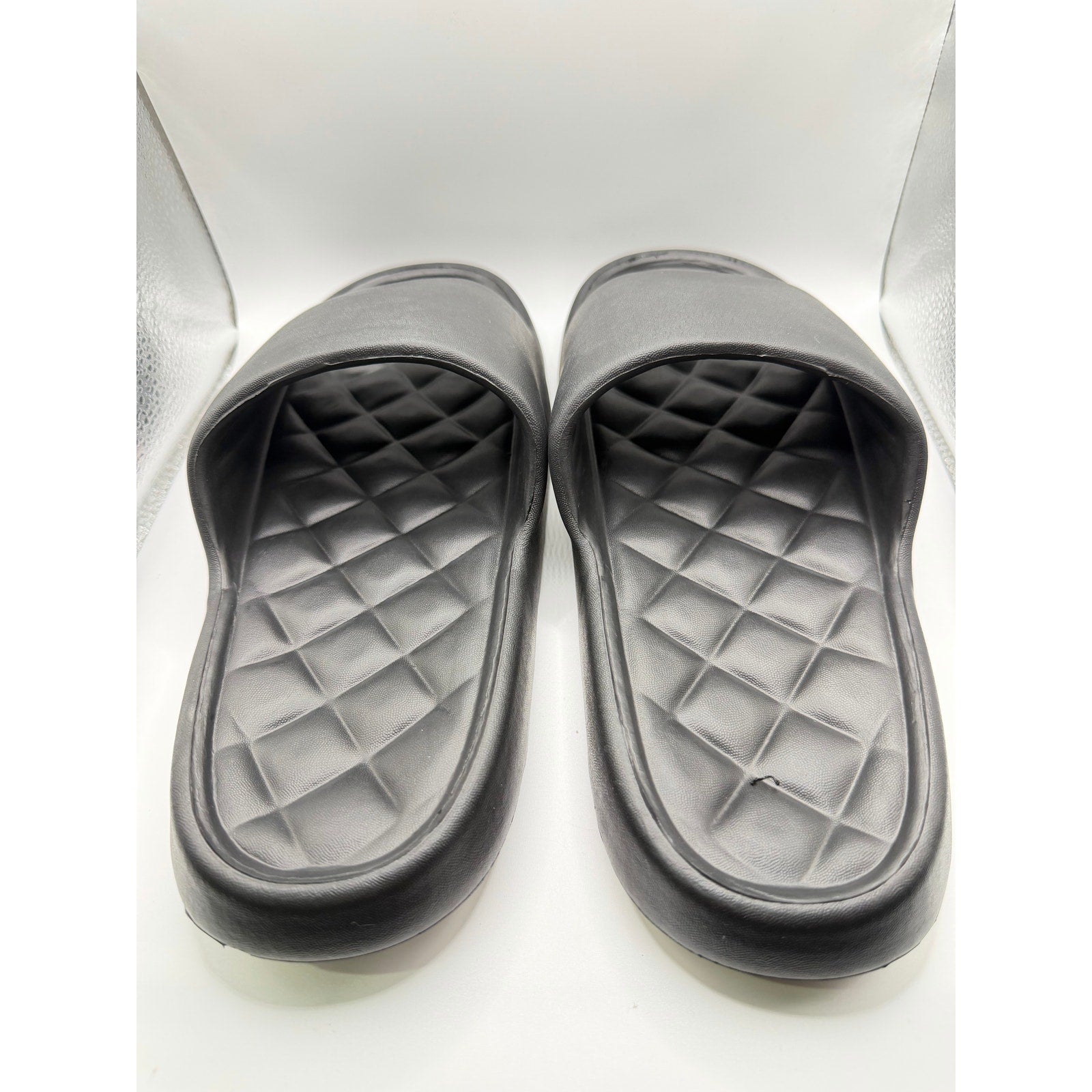 Black Busy Lion Reality Summer Adventures Slides in size 9.5-10, featuring a playful lion design and comfortable slip-on style.