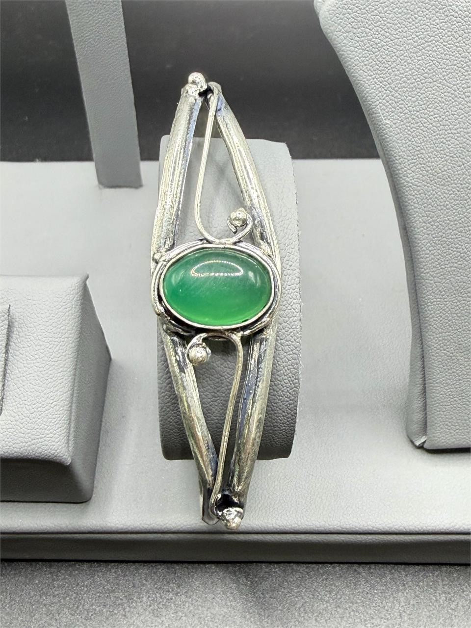 Silver plated bangle gem bracelet with intricate handcrafted design from Republic Mercantile, featuring colorful gemstone accents.