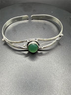 Silver plated bangle gem bracelet with handcrafted design featuring sparkling stones, stylish jewelry by Republic Mercantile.