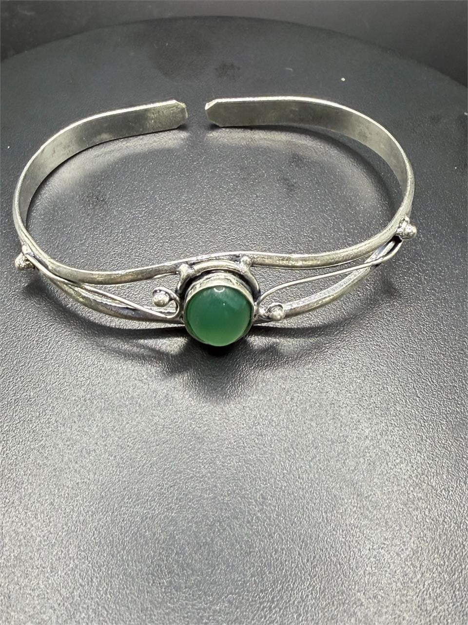 Silver plated bangle gem bracelet with handcrafted design featuring sparkling stones, stylish jewelry by Republic Mercantile.