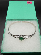 Silver plated bangle bracelet with embedded colorful gemstones, handcrafted by Republic Mercantile.