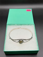 Silver plated bangle gem bracelet by Republic Mercantile featuring handcrafted design and sparkling gemstone accents.