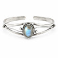 Silver plated bangle gem bracelet with handcrafted design, featuring sparkling gemstones, by Republic Mercantile.