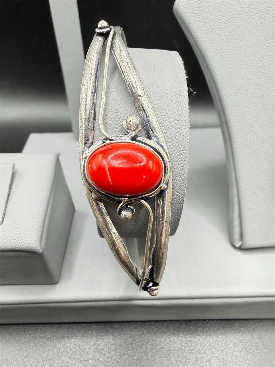 Silver plated bangle gem bracelet with handcrafted design, featuring intricate details and sparkling gemstones from Republic Mercantile.