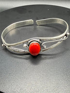 Silver plated bangle bracelet with embedded gemstones, handcrafted by Republic Mercantile, featuring a sleek, elegant design.